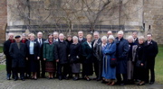 CES Missionaries in Hildesheim in front of the thousand -year-old Rosebush