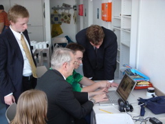 Elder Allen with Young Adults editing their video of the Temple Trip
